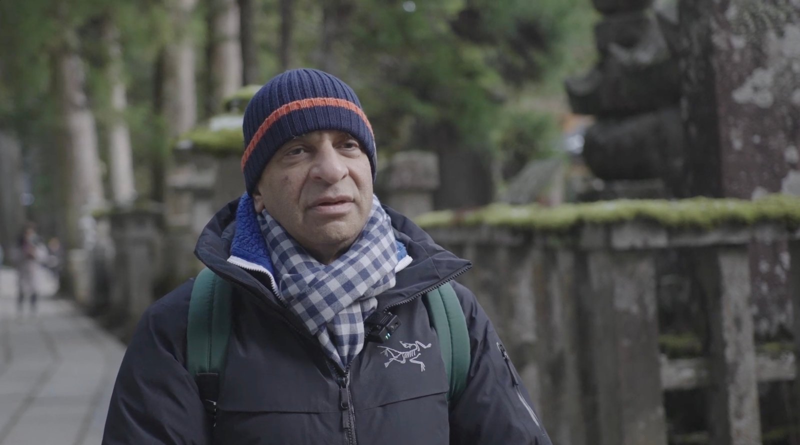 Lord Rumi Verjee speaking among the cedars and stone monuments of Okunoin.